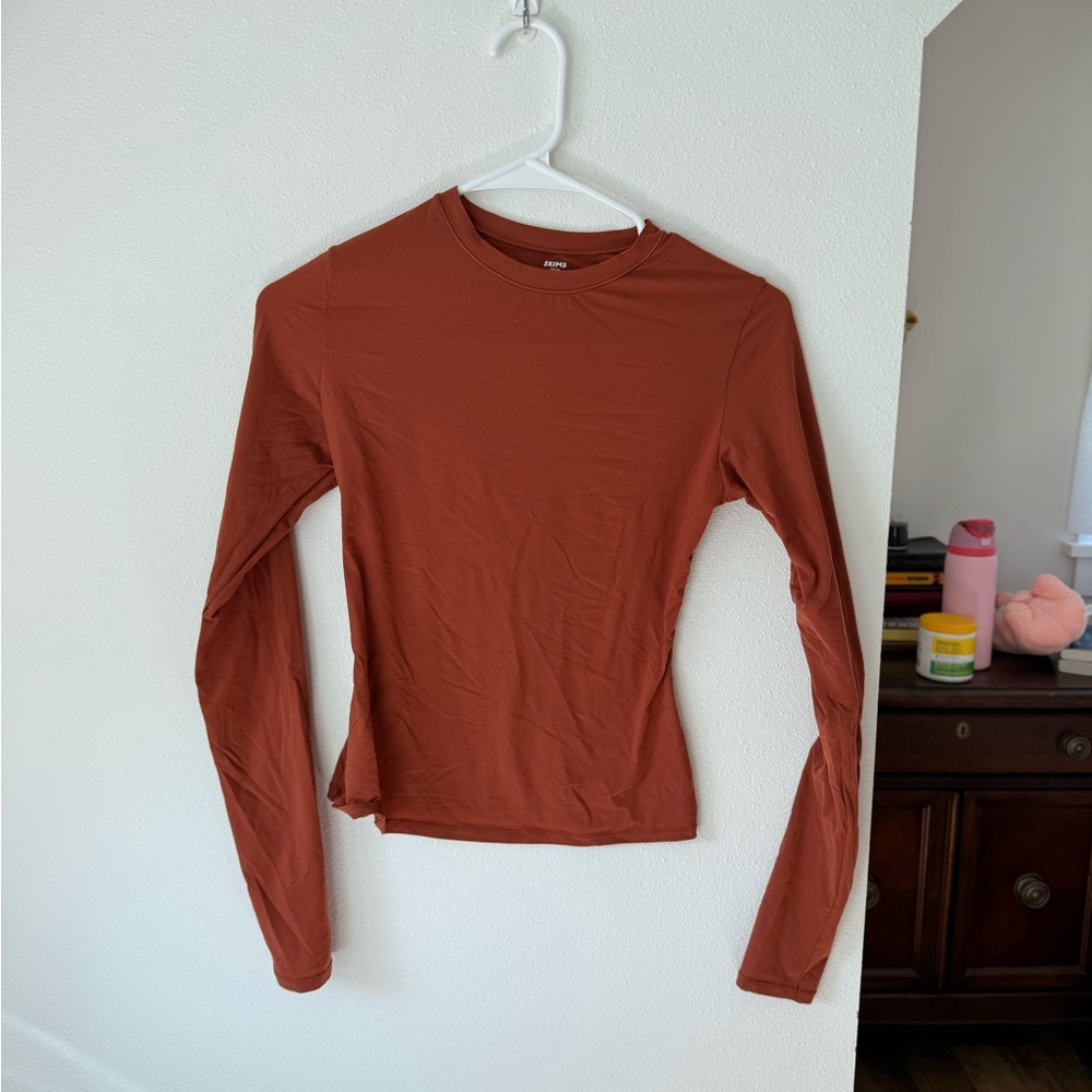 SKIMS Long Sleeve Fits Everybody Top in Burnt Orange